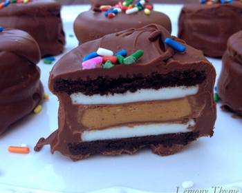 Easy Serving Recipe Chocolate dipped peanut butter stuffed oreos Yummy