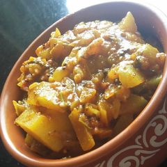 A picture of Dudhi batata bhaji(bottle gourd potato curry).