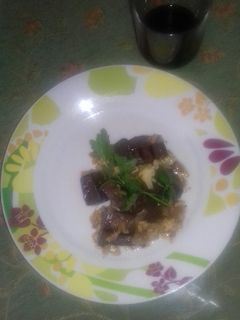 Una foto de Revuelto de sangre encebollada