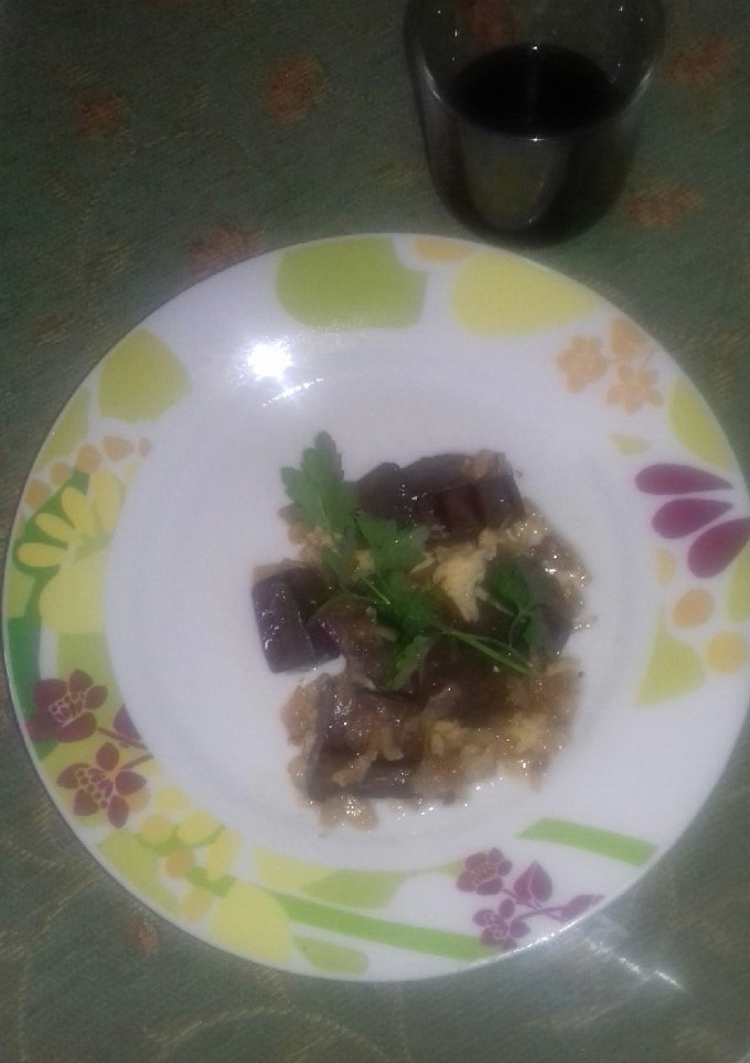 Una foto de Revuelto de sangre encebollada