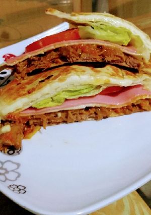 Una foto de Sándwich de Carne mechada