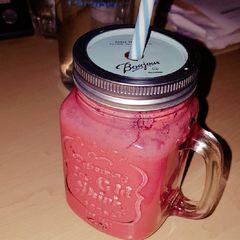 A picture of Natural yoghurt and fruits smoothie.