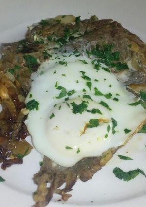 Una foto de Costeleta con huevo a la provenzal