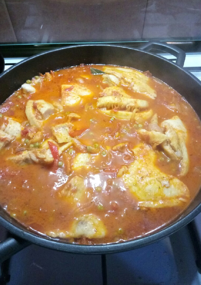 Una foto de Filetes de merluza con tomate