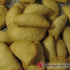 A picture of Mini olive pies by Vaggelio.