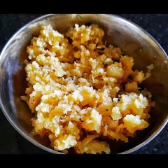 A picture of Coconut khadi | fat rich sweet dish.