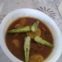 A picture of Aalu gosht(mutton).