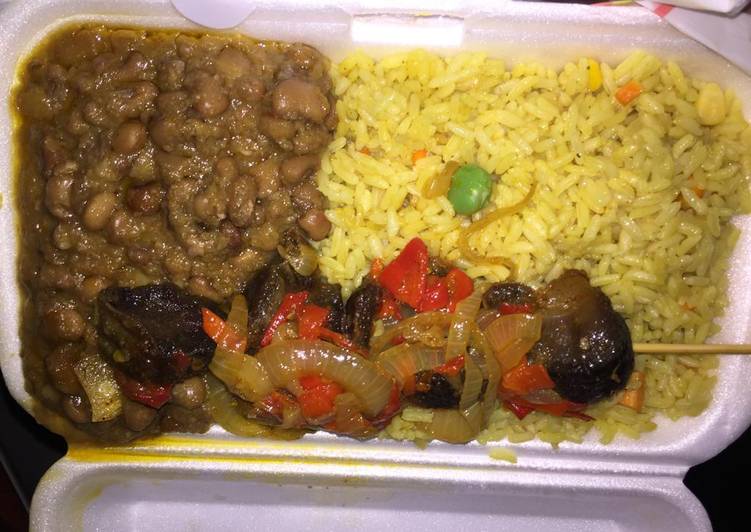 Fried rice and beans with beef kebab
