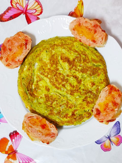 Una foto de Tortilla de cebolla y perejil
