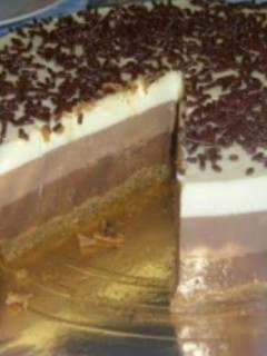 Una foto de Tarta tres chocolates