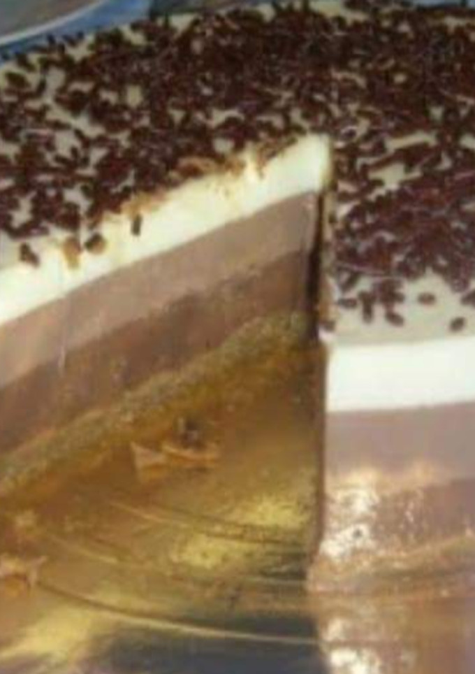 Una foto de Tarta tres chocolates