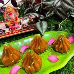 A picture of Papaya Churma Modak.