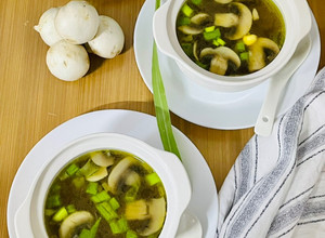 A picture of Tom Yum Soup with Mushrooms and Sweet Corn.