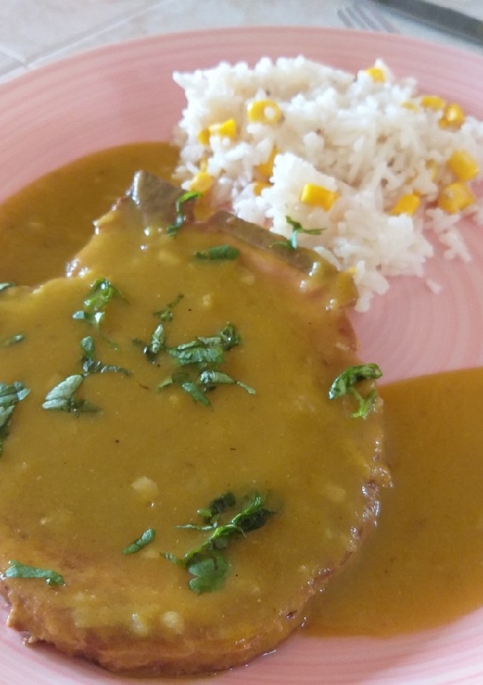 Una foto de Chuletas en salsa verde
