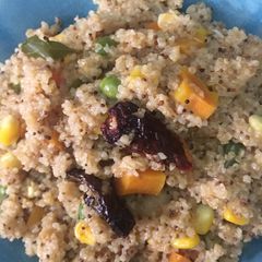 A picture of Broken wheat or Daliya with vegetables.