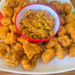 A picture of Orange sweet potato balls.