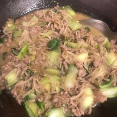 A picture of Bokchoy and ground meat in miso sauce.