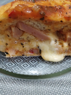 Una foto de Pizza arrollada rellena