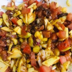 A picture of Ensaladang mangga (green manggo salad with shrimp paste) a Filipino recipe.