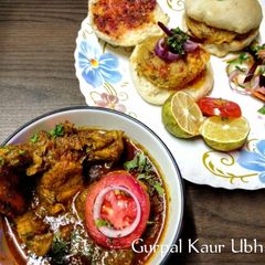 A picture of 🌿 Emerald Spice Chicken Curry with Punjabi Vada Sliders.