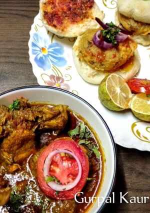 A picture of 🌿 Emerald Spice Chicken Curry with Punjabi Vada Sliders.
