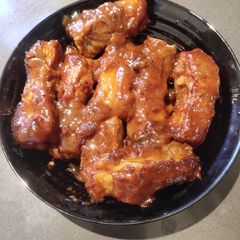A picture of Ribs with Ketchup.