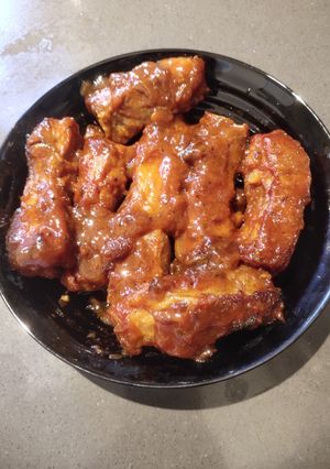 A picture of Ribs with Ketchup.