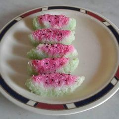 A picture of Water melon shaped coconut Burfi.