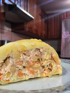 Una foto de Rollo de papa y pollo