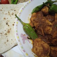 A picture of Achar gosht with homemade masala.