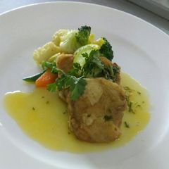 A picture of Fish Meuniere with Saute Vegetables.