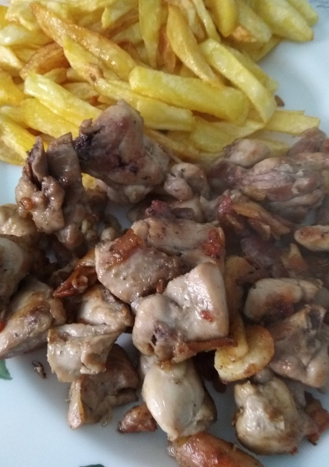 Una foto de 🐔 Pollo al ajillo