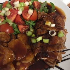 A picture of Seared duck breasts in honey, soy and ginger.