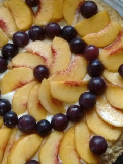 Una foto de Tarta frutal🍑🍇