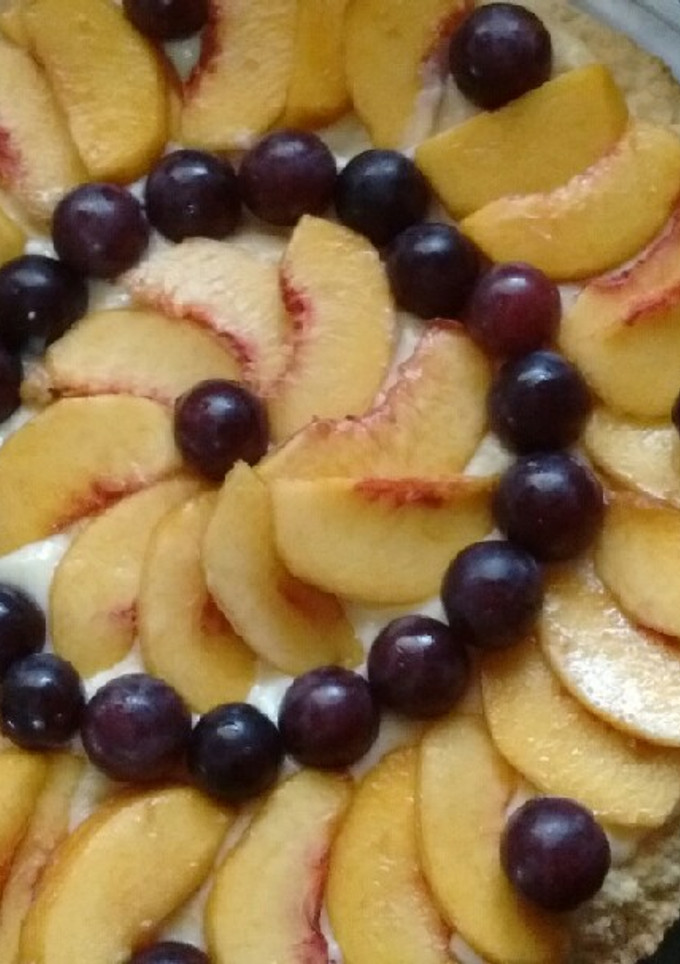 Una foto de Tarta frutal🍑🍇