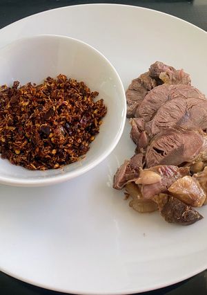 A picture of Steamed Beef Shank with Galangal Chili Paste.