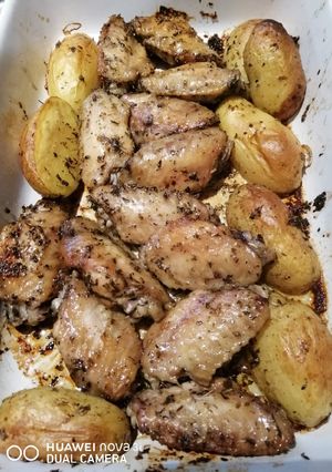 A picture of Baked Wings and Potato.