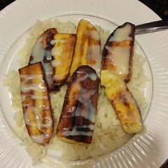 A picture of Brad's fried plantains over rice.