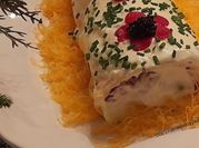 Una foto de pionono relleno con atún