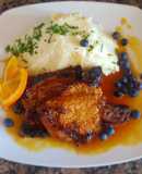 Costillas de cerdo, con salsa de naranja + puré