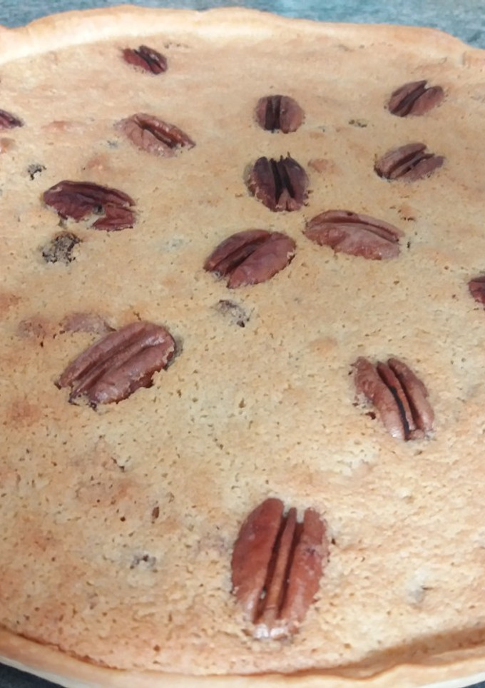 Una foto de Tarta de frutos secos con crema de almendra