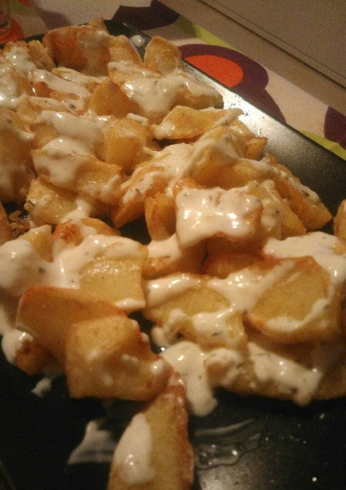 Una foto de Patatas alioli