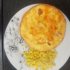 A picture of Two cheese and cherry tomato omelette :).