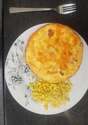 A picture of Two cheese and cherry tomato omelette :).