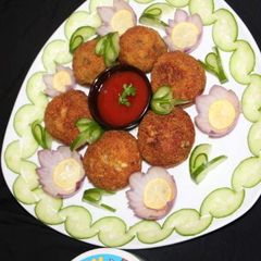 A picture of Cheezy potatoes balls.