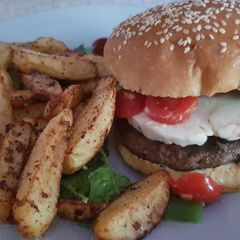 A picture of My Hallumi Steak Burger on a seeded Brioch Bun ❤.