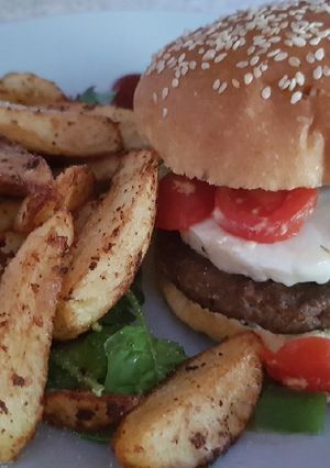 A picture of My Hallumi Steak Burger on a seeded Brioch Bun ❤.
