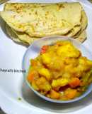 Naan bread and buttered potatoe curry soup