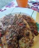 Canelones de acelga con yogurt griego a la boloñesa