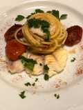 Spaghetti con scorfano e pomodori confit